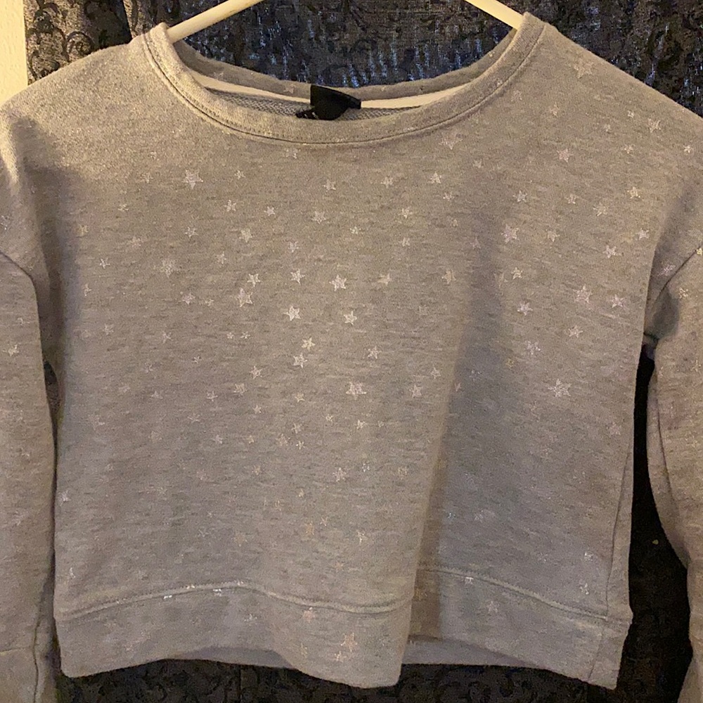 Really cute little girls sweater with little bell arm cuffs so cute